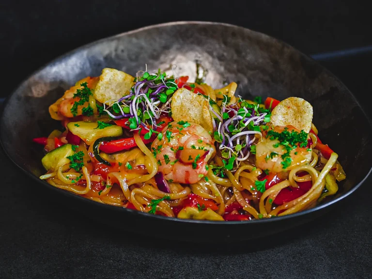 Heerlijke wok scampi bij restaurant Happy Days